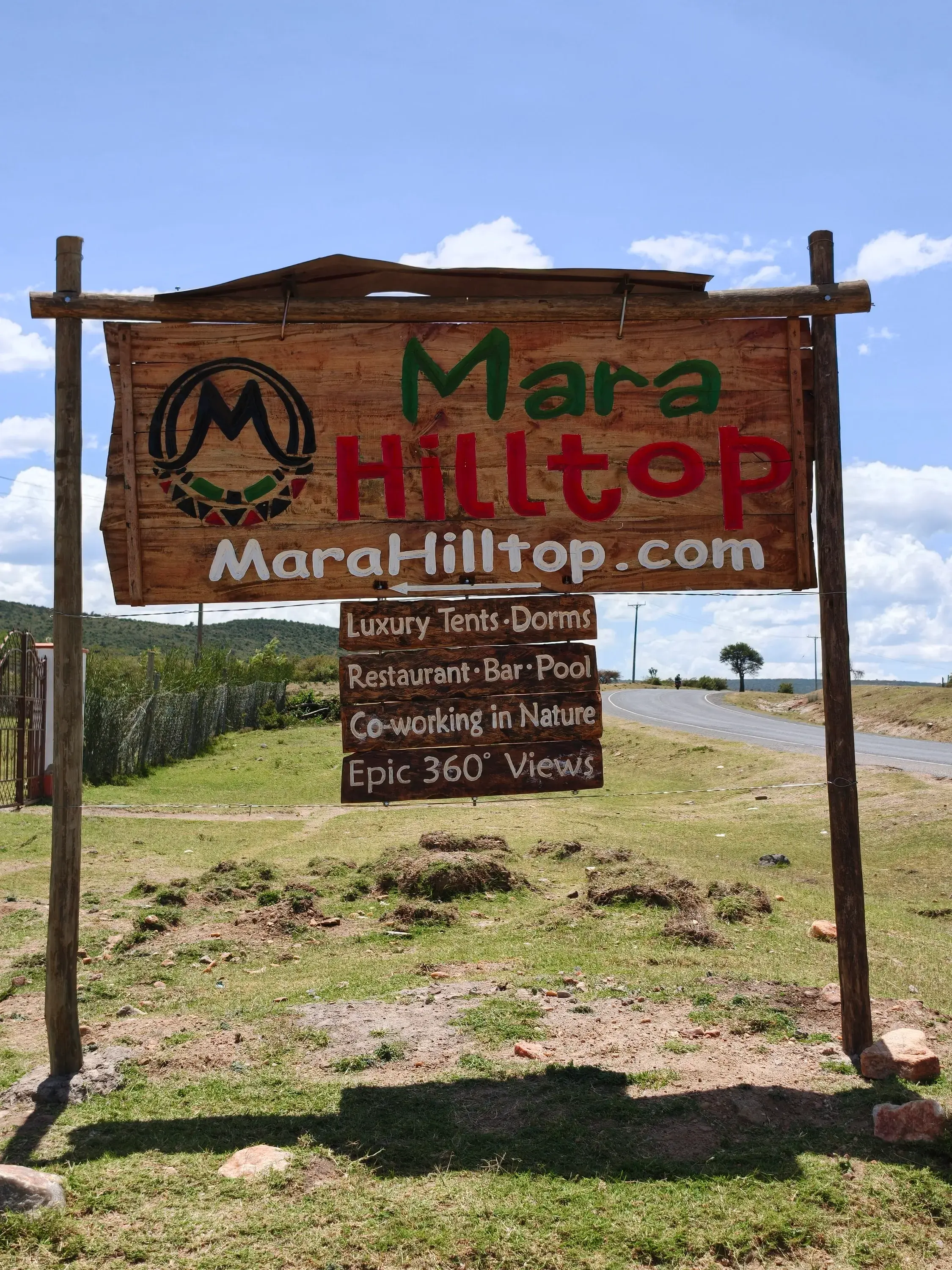 The Mara Hilltop sign at the roadside entrance