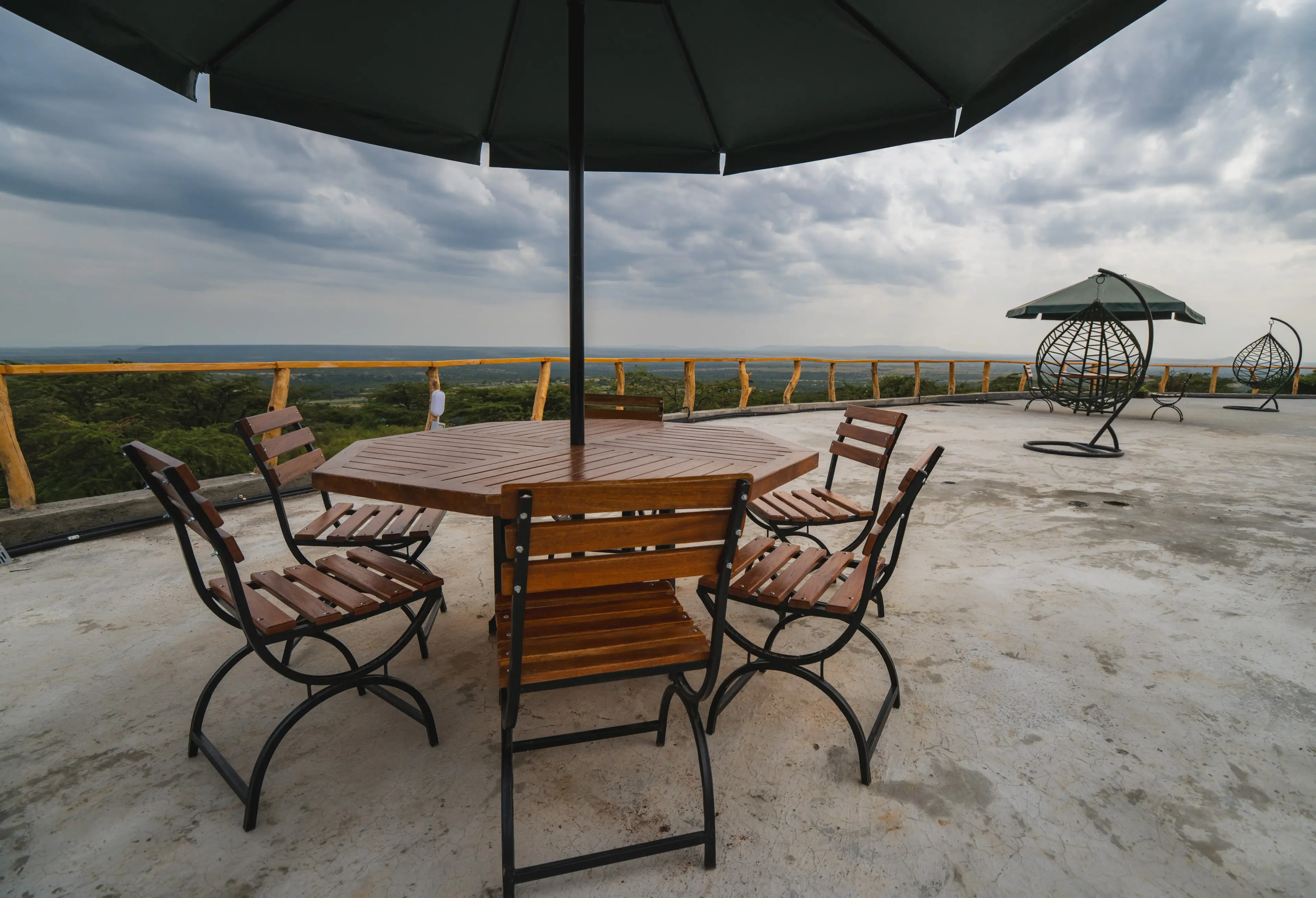 Tables and chairs on the rooftop deck